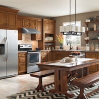 Eastland kitchen with glazed cabinets that exude a homemade charm