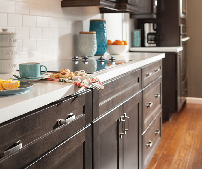 Dark gray kitchen cabinets by Aristokraft Cabinetry
