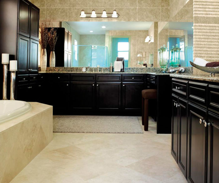 Sarsaparilla cabinets in traditional bathroom by Aristokraft Cabinetry